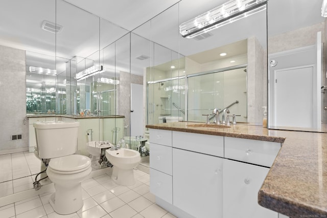 3200 Park Ave Unit 9B1, Bridgeport, CT 06604 - full bathroom with a bidet, vanity, a stall shower, and tile patterned floors