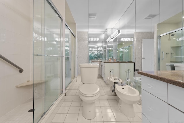 3200 Park Ave Unit 9B1, Bridgeport, CT 06604 - full bath featuring vanity, a shower stall, tile patterned flooring, a bidet, and tile walls