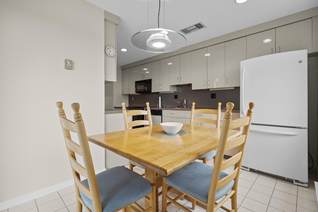 3200 Park Ave Unit 9B1, Bridgeport, CT 06604 - dining room featuring light tile patterned floors and recessed lighting