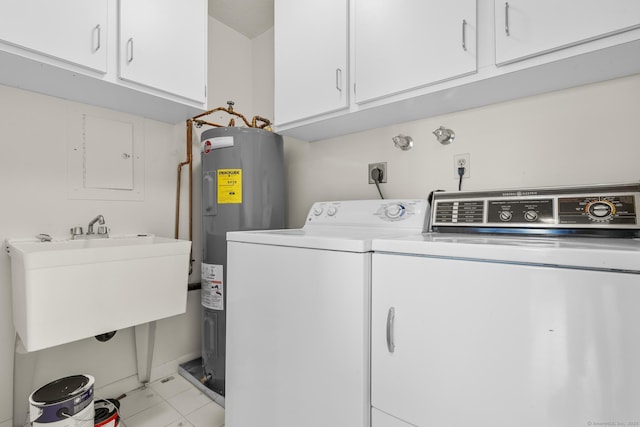 3200 Park Ave Unit 9B1, Bridgeport, CT 06604 - laundry area featuring water heater, cabinet space, washer and clothes dryer, and light tile patterned floors