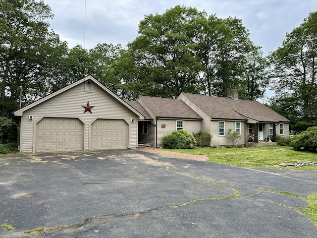 123 Silkey Rd, Granby, CT 06060 - view of front of house with asphalt driveway, a chimney, an attached garage, and a front yard