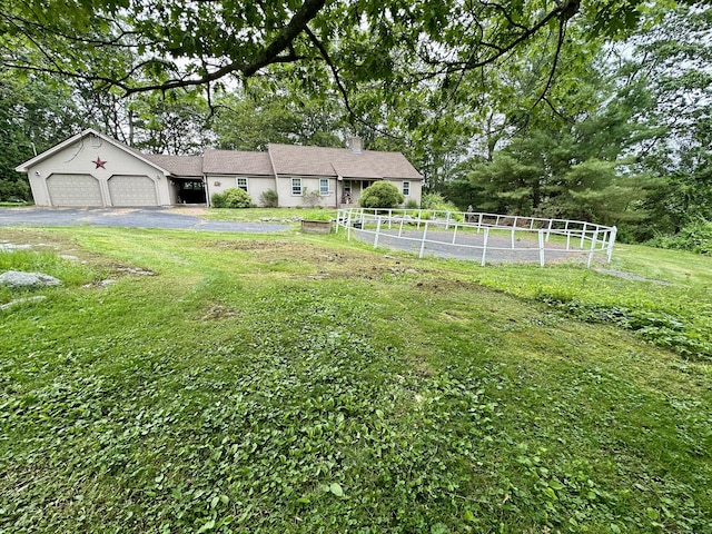 123 Silkey Rd, Granby, CT 06060 - view of yard with a garage and driveway