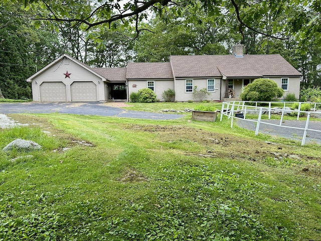 123 Silkey Rd, Granby, CT 06060 - ranch-style house with a garage, asphalt driveway, and a chimney
