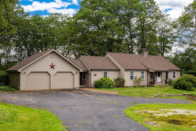 123 Silkey Rd, Granby, CT 06060 - view of front of property featuring a chimney, roof with shingles, a garage, view of wooded area, and a front lawn