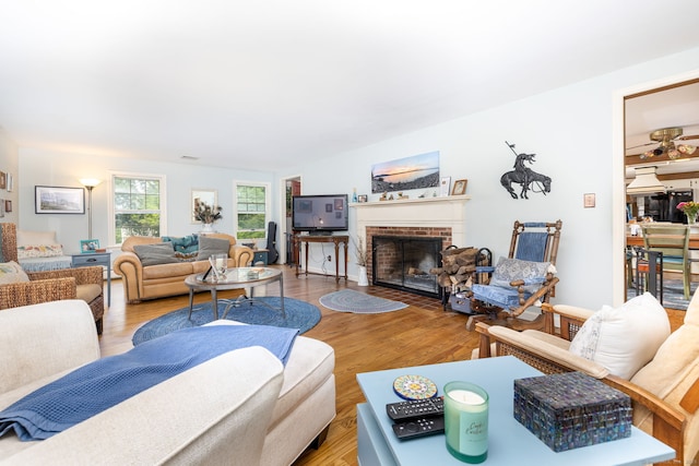 123 Silkey Rd, Granby, CT 06060 - living room with a fireplace, wood finished floors, and ceiling fan