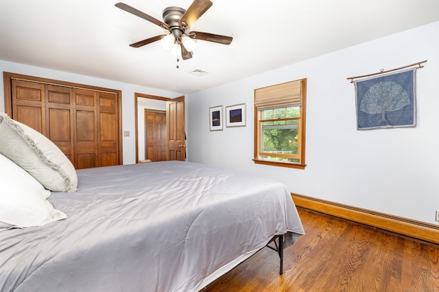 123 Silkey Rd, Granby, CT 06060 - bedroom with wood finished floors, ceiling fan, and baseboard heating
