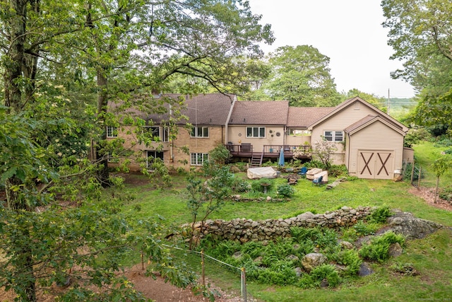 123 Silkey Rd, Granby, CT 06060 - rear view of property featuring a wooden deck, a storage shed, and a yard