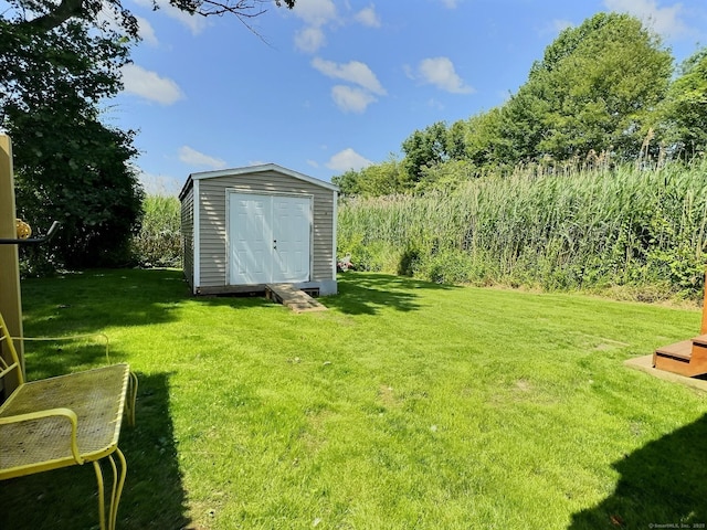 102 Surf Ave, Milford, CT 06460 - view of grassy yard with a storage shed