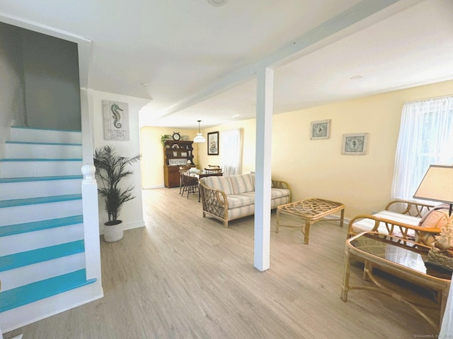 102 Surf Ave, Milford, CT 06460 - living area featuring wood finished floors and stairs