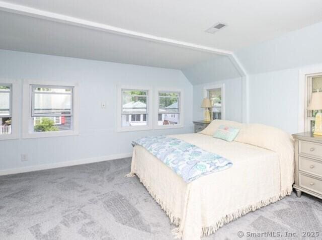 102 Surf Ave, Milford, CT 06460 - carpeted bedroom featuring vaulted ceiling and baseboards