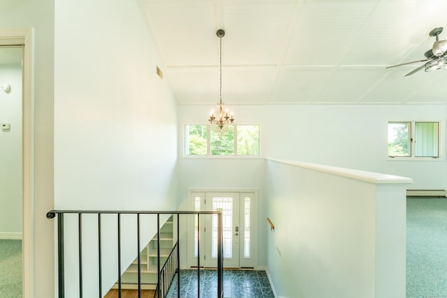 24 Newton St, Norwich, CT 06360 - stairway with a baseboard radiator, a chandelier, a ceiling fan, and high vaulted ceiling