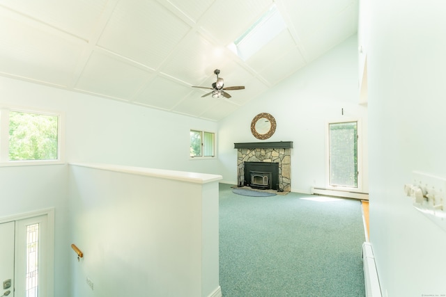 24 Newton St, Norwich, CT 06360 - unfurnished living room with baseboard heating, high vaulted ceiling, plenty of natural light, carpet flooring, and ceiling fan