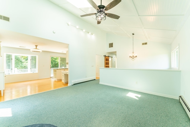 24 Newton St, Norwich, CT 06360 - unfurnished living room with carpet floors, a barn door, baseboard heating, a ceiling fan, and a chandelier