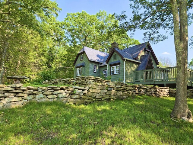 483 Providence Tpke, Hampton, CT 06247 - view of side of home featuring a chimney and a deck