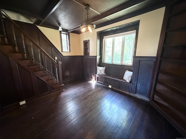 483 Providence Tpke, Hampton, CT 06247 - living room with a wainscoted wall, stairs, dark wood-type flooring, and a decorative wall