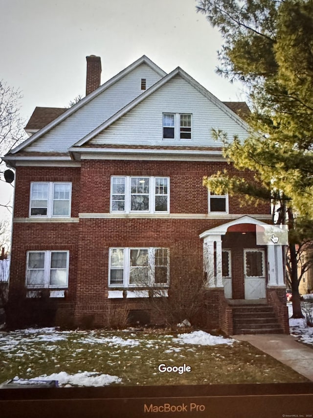 17 Maplewood Ave, West Hartford, CT 06119 - view of front of property featuring a chimney and brick siding