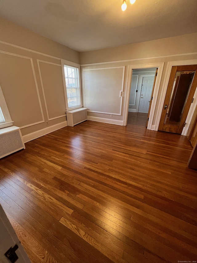 17 Maplewood Ave, West Hartford, CT 06119 - unfurnished bedroom with dark wood-type flooring