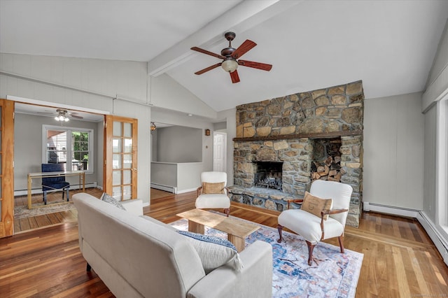 421 Hemlock Point Dr, Coventry, CT 06238 - living area featuring ceiling fan, a baseboard radiator, hardwood / wood-style floors, and a fireplace