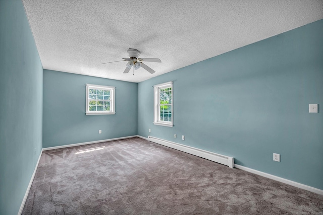 421 Hemlock Point Dr, Coventry, CT 06238 - empty room featuring baseboard heating, a ceiling fan, carpet, and a textured ceiling