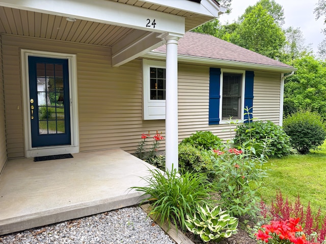 24 Alger Rd, East Haddam, CT 06423 - view of exterior entry featuring a shingled roof