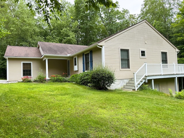 24 Alger Rd, East Haddam, CT 06423 - rear view of property featuring a lawn and a wooden deck