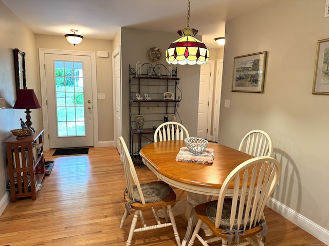 24 Alger Rd, East Haddam, CT 06423 - dining area with light wood-type flooring and baseboards