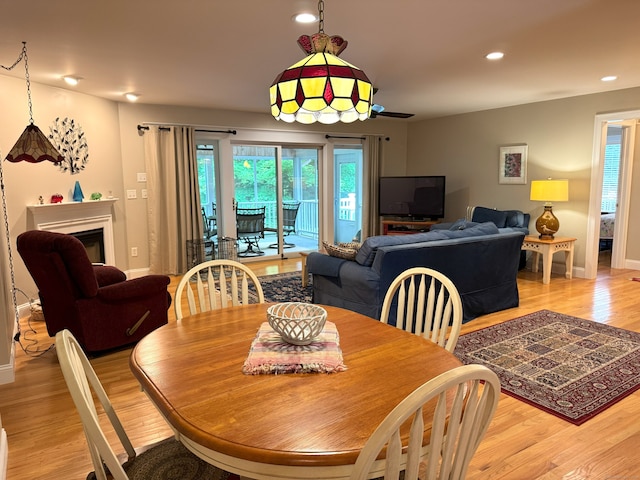 24 Alger Rd, East Haddam, CT 06423 - dining space with light wood-style flooring, healthy amount of natural light, recessed lighting, and a fireplace