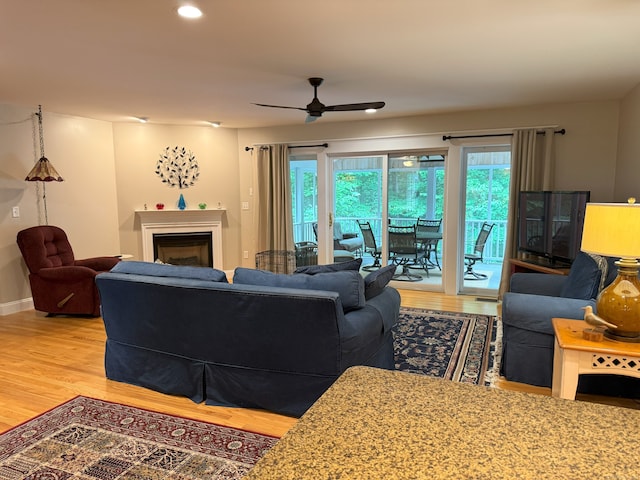 24 Alger Rd, East Haddam, CT 06423 - living room with wood finished floors, ceiling fan, plenty of natural light, a fireplace, and recessed lighting