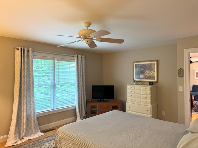 24 Alger Rd, East Haddam, CT 06423 - bedroom with wood finished floors, multiple windows, and ceiling fan