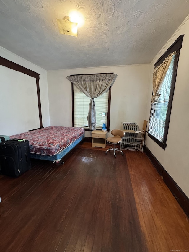 478 E Main St, Norwich, CT 06360 - bedroom featuring hardwood / wood-style floors and a textured ceiling