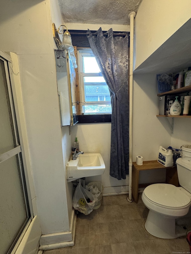 478 E Main St, Norwich, CT 06360 - bathroom featuring toilet and an enclosed shower