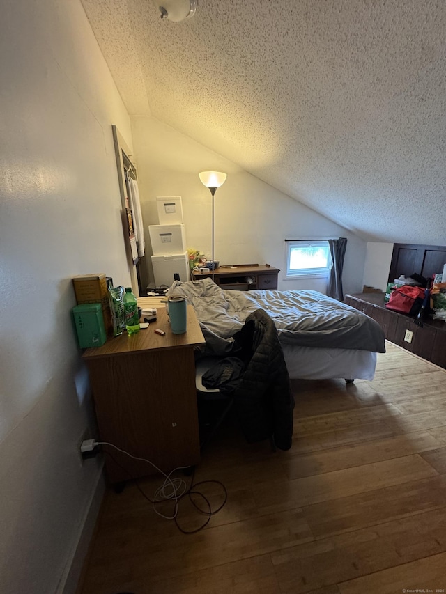 478 E Main St, Norwich, CT 06360 - bedroom with vaulted ceiling, a textured ceiling, and wood finished floors