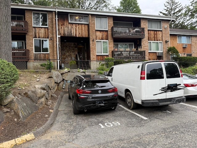 333 Vincellette St Unit 109, Bridgeport, CT 06606 - view of building exterior with uncovered parking