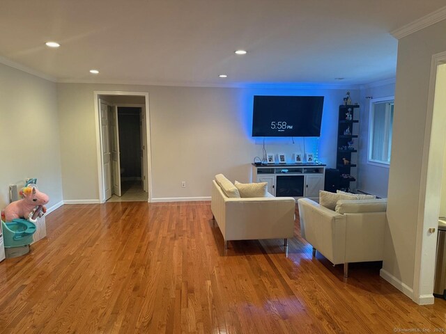 333 Vincellette St Unit 109, Bridgeport, CT 06606 - living area with ornamental molding, wood finished floors, and recessed lighting