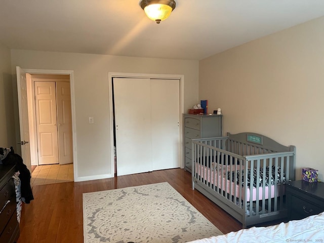 333 Vincellette St Unit 109, Bridgeport, CT 06606 - bedroom featuring a closet and wood finished floors