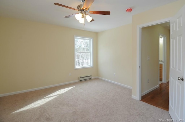 446G Norwich-Westerly Rd, North Stonington, CT 06359 - empty room featuring a baseboard radiator, carpet floors, and ceiling fan