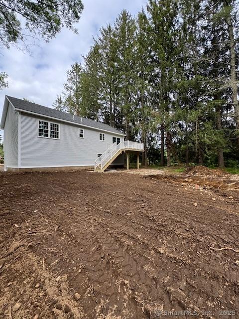 446G Norwich-Westerly Rd, North Stonington, CT 06359 - back of property with stairs and a deck