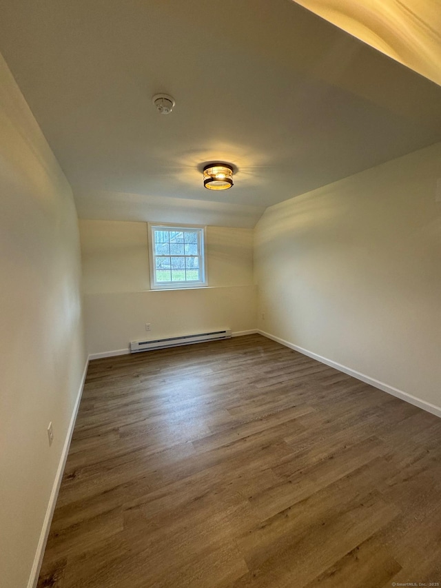 446G Norwich-Westerly Rd, North Stonington, CT 06359 - additional living space featuring baseboard heating and dark wood-style floors