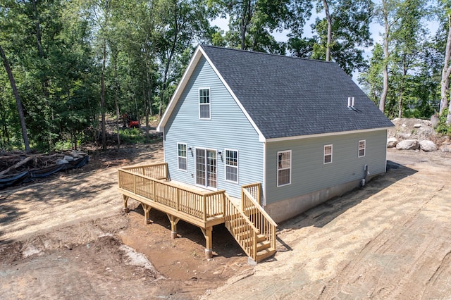 248 Rukstella Rd, Brooklyn, CT 06234 - rear view of property with a shingled roof, a wooden deck, and stairs