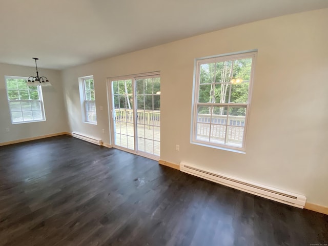 248 Rukstella Rd, Brooklyn, CT 06234 - empty room with a baseboard radiator, a chandelier, and dark wood-type flooring