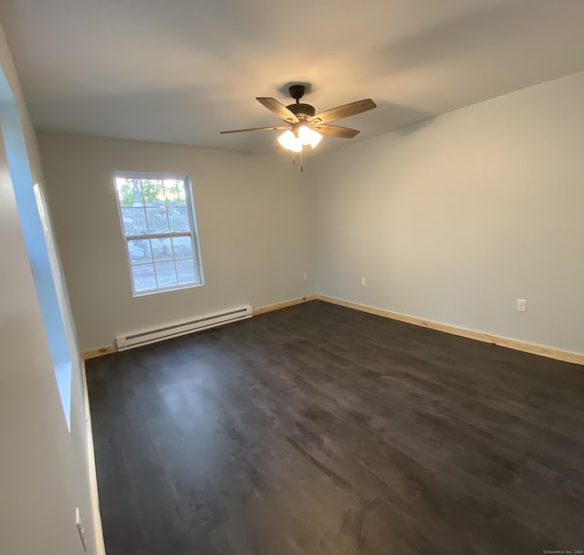 248 Rukstella Rd, Brooklyn, CT 06234 - empty room with a baseboard heating unit, a ceiling fan, and dark wood-style flooring