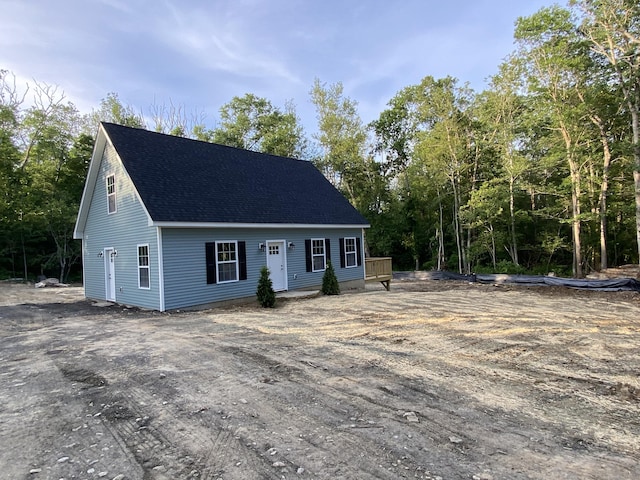 248 Rukstella Rd, Brooklyn, CT 06234 - new england style home with roof with shingles and a wooden deck
