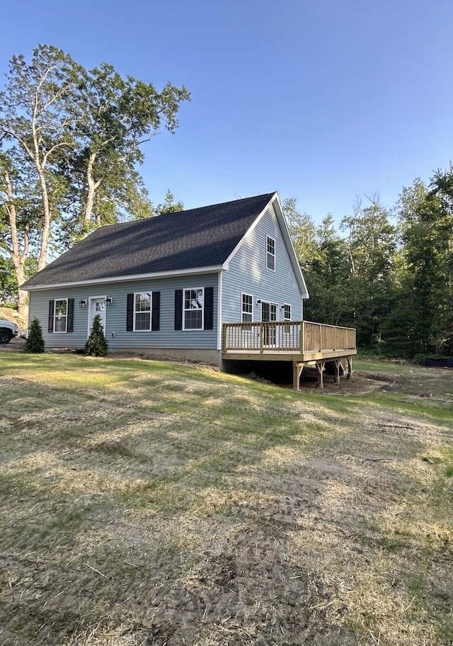 248 Rukstella Rd, Brooklyn, CT 06234 - view of front of home with a deck and a front lawn