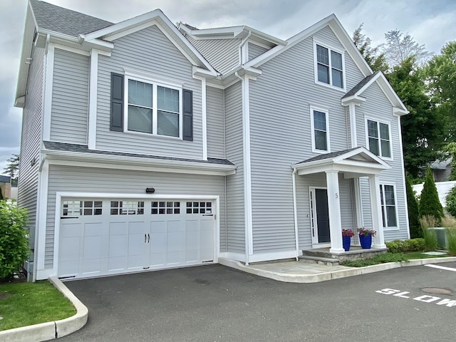 159 Colonial Rd Unit 5, Stamford, CT 06906 - traditional-style home with a garage
