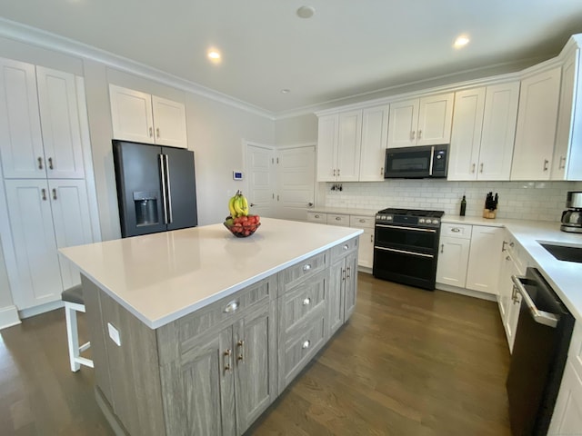 159 Colonial Rd Unit 5, Stamford, CT 06906 - kitchen with black fridge with ice dispenser, gas stove, dishwasher, dark wood finished floors, and crown molding
