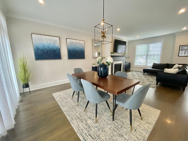 159 Colonial Rd Unit 5, Stamford, CT 06906 - dining room with dark wood-type flooring, a fireplace, crown molding, and recessed lighting