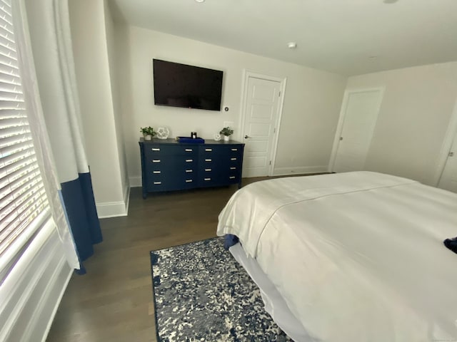 159 Colonial Rd Unit 5, Stamford, CT 06906 - bedroom featuring dark wood-style floors and baseboards