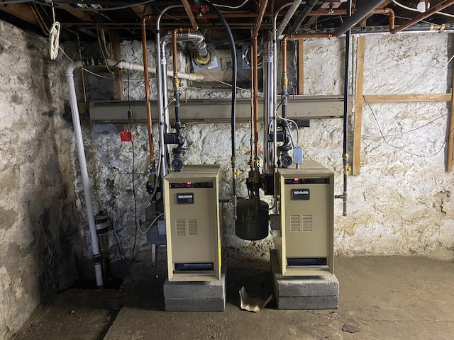 114 Pulaski St, Torrington, CT 06790 - utility room with a heating unit