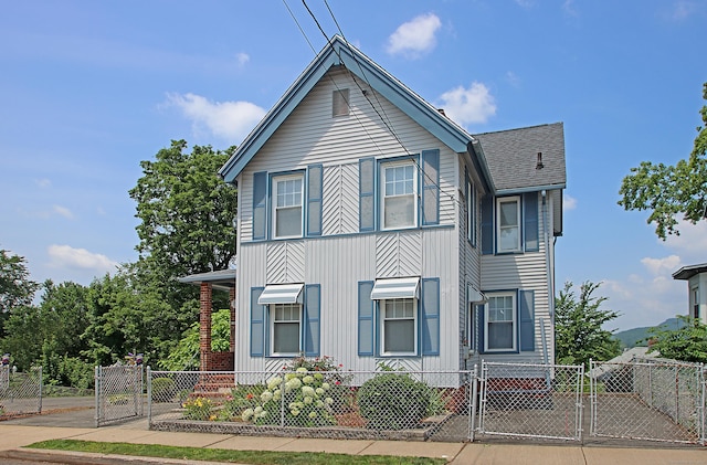 34 Hobart St, Meriden, CT 06450 - view of front of home with a gate, roof with shingles, and board and batten siding