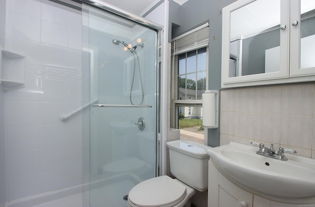 34 Hobart St, Meriden, CT 06450 - full bathroom featuring a stall shower, vanity, tile walls, and tasteful backsplash